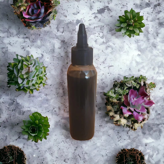 Authentic Jamaican Black Castor Oil infused with Rosemary 4ounces